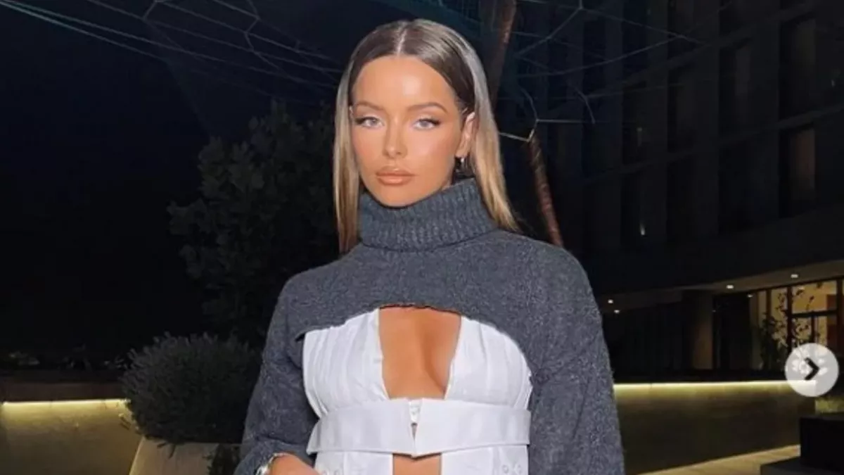 Maura Higgins shows a glimpse of her saucy nipple piercing