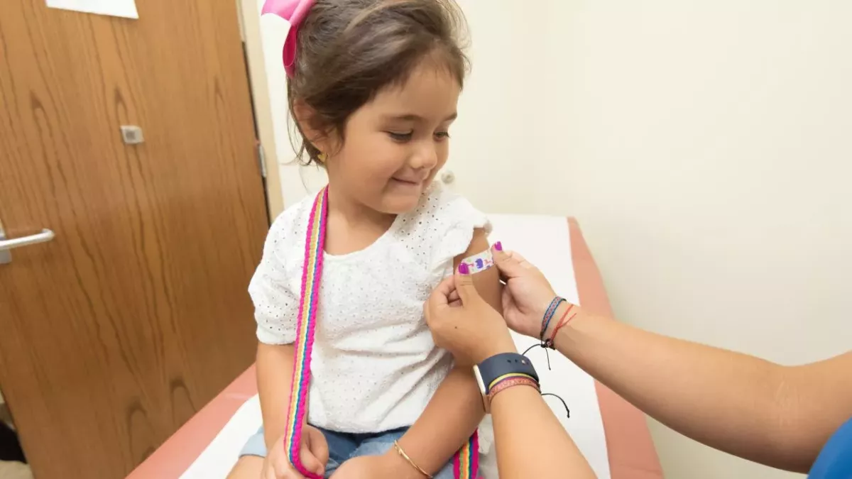 Children may be receiving COVID vaccine as early as August 