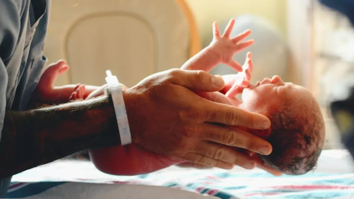 Baby born with IUD in hand