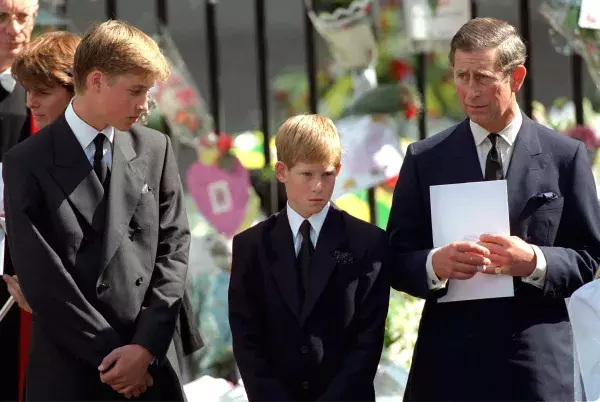 Following the tragic death of Princess Diana in 1997, Prince Charles and his sons William and Harry are seen here at her funeral.