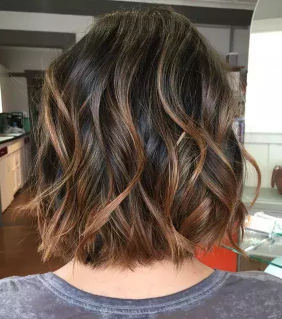 Add soft warm highlights to your hairstyle. It's the perfect look for a subtle yet classy style!