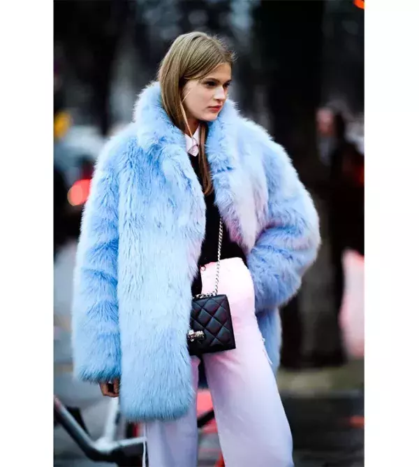 A fake fur coat and white jeans @Pinterest