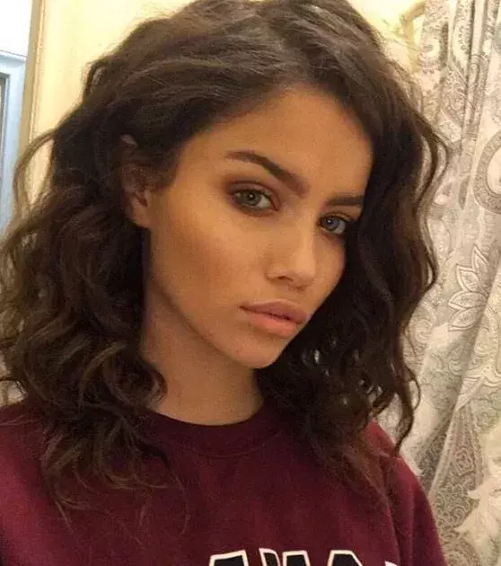 Simple all-over colour with semi-tight curls is always appealing. This hairstyle could be dressed up or down!