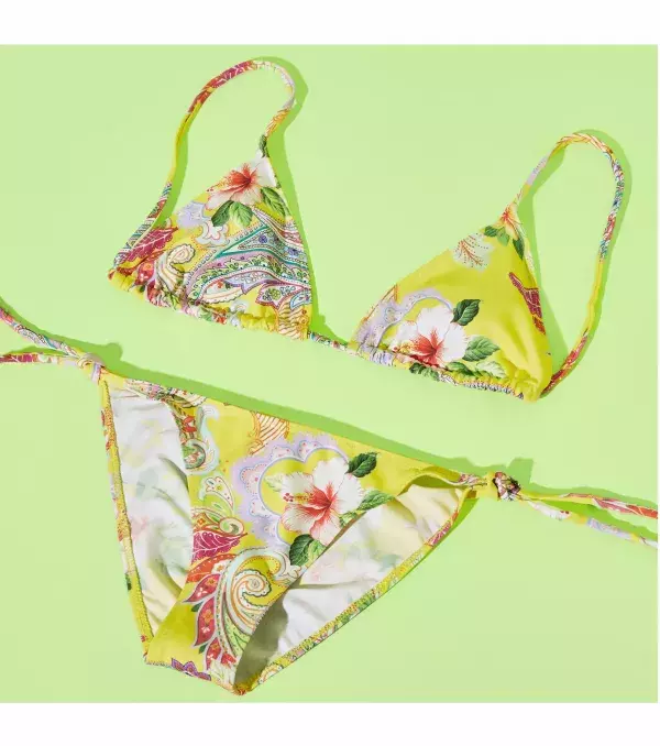 Want to stand out with yellow?Try this bright paisley bikini from Zara.