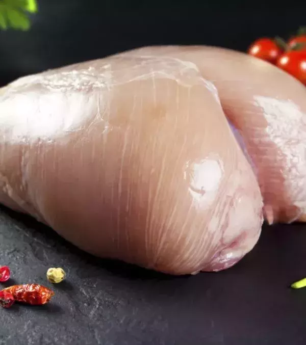 Chicken: Raw chicken meat can vary in colour but is mainly a yellowish-tan colour. The pink colour comes from the mixture of myoglobin and the air. Myoglobin is a protein present in the meat.