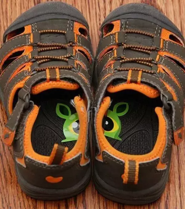 Cut cute cartoon stickers in half and put them in your child's shoes. It will remind them of where the left and right shoe is.